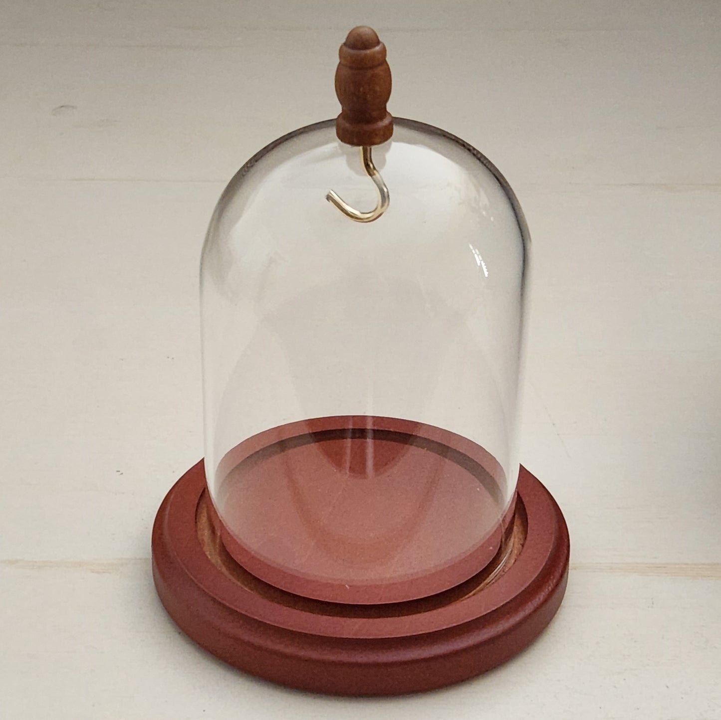 Pocket watch glass display dome cloche wood knob and hook walnut stained base 3"x4", front view.